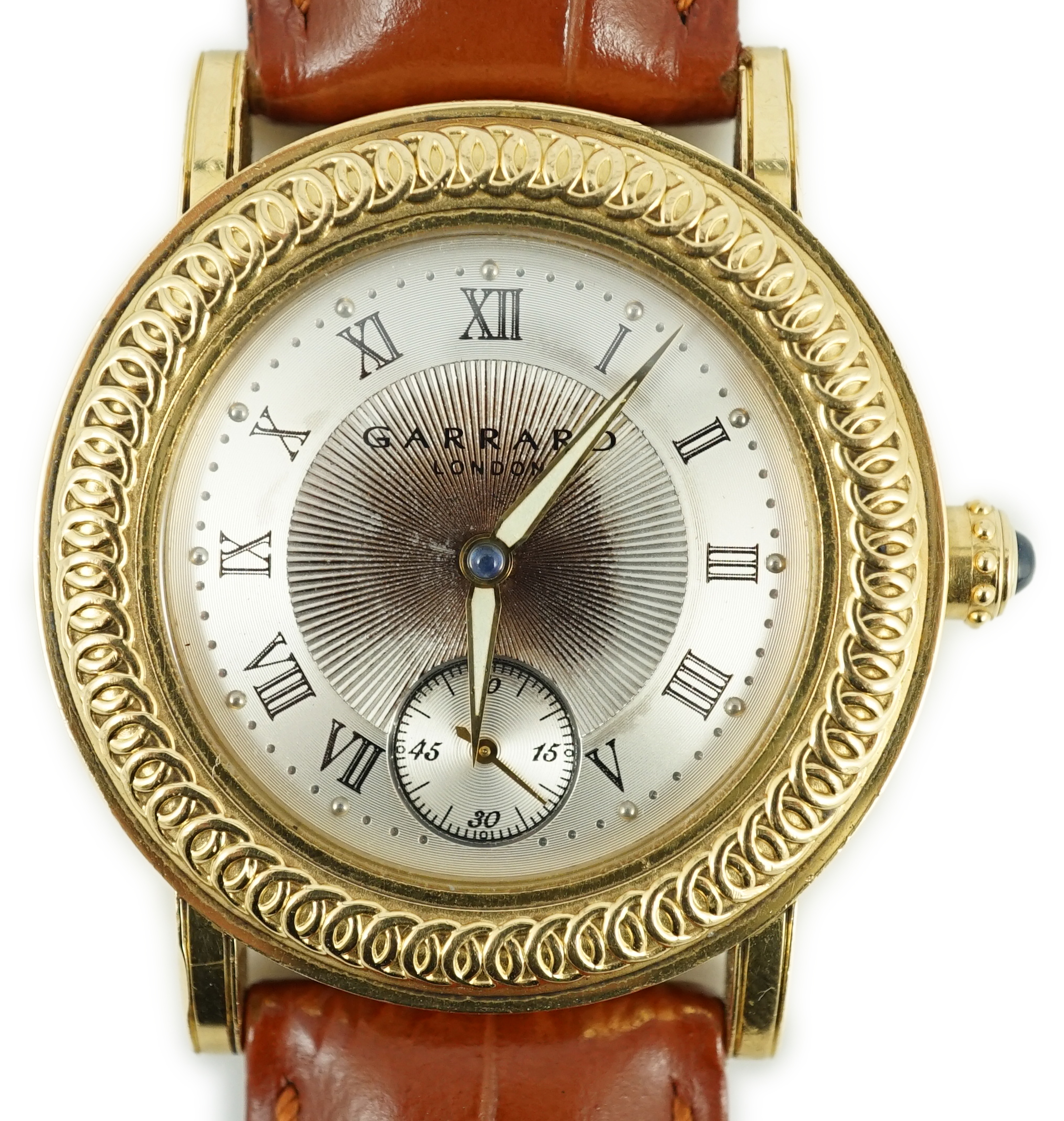 A gentleman's Garrard 18ct gold 150th anniversary automatic wrist watch